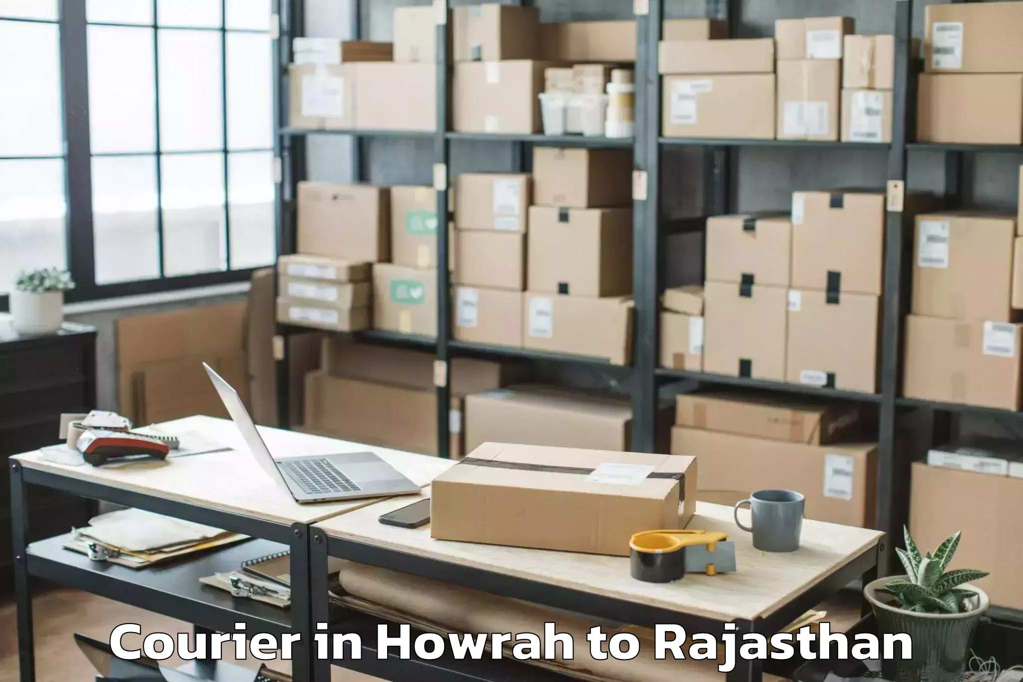 Book Howrah to Kotputli Courier